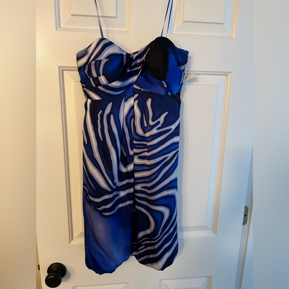 Cache size 4 strapless dress. Excellent condition.